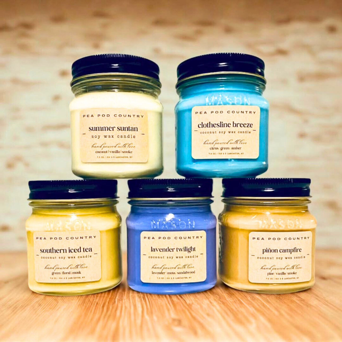 Five 7.5 oz mason jar candles representing the summer scent collection.